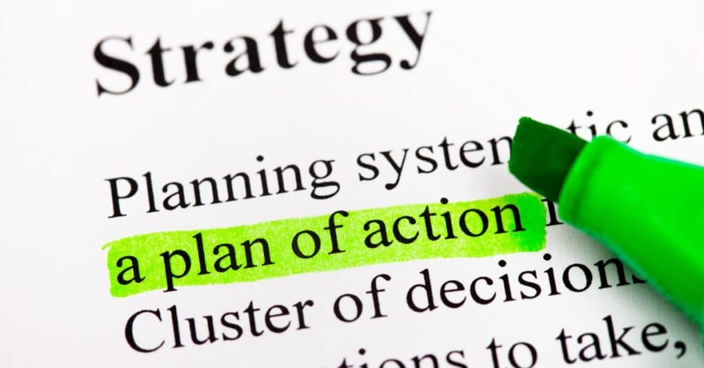 Strategy definition with "a plan of action" highlighted in green