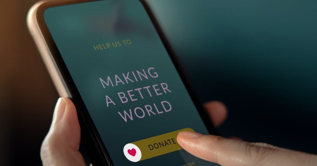 Person swiping on a phone screen to donate