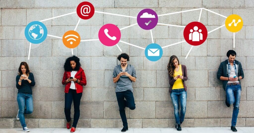 Group of people standing against wall, connected by social media