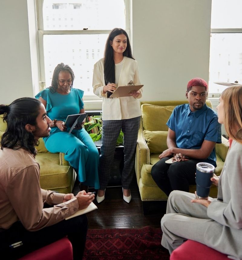 Nonprofit event image Woman sitting at a computer having a meeting